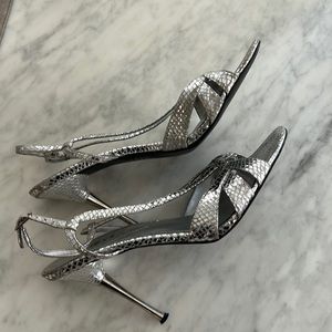 Guess by Marciano .. silver evening sandals worn 2 times.. really cute!